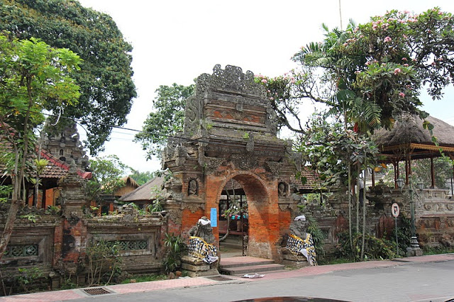 This gorgeous palace is set in the center of Ubud, Bali with a traditional art market just in front 